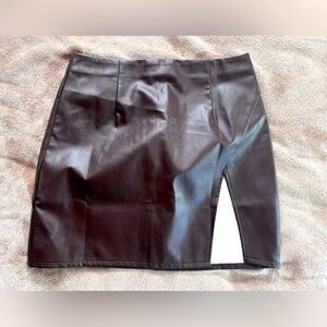 New w tags. Dark brown faux leather skirt with slit. Lulus. Size Medium.